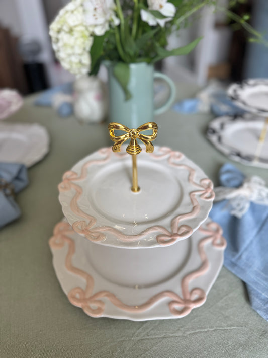 Anthropologie Benedita Bow Two-Tier Stand with Gold Bow Handle – White & Blush Pink
