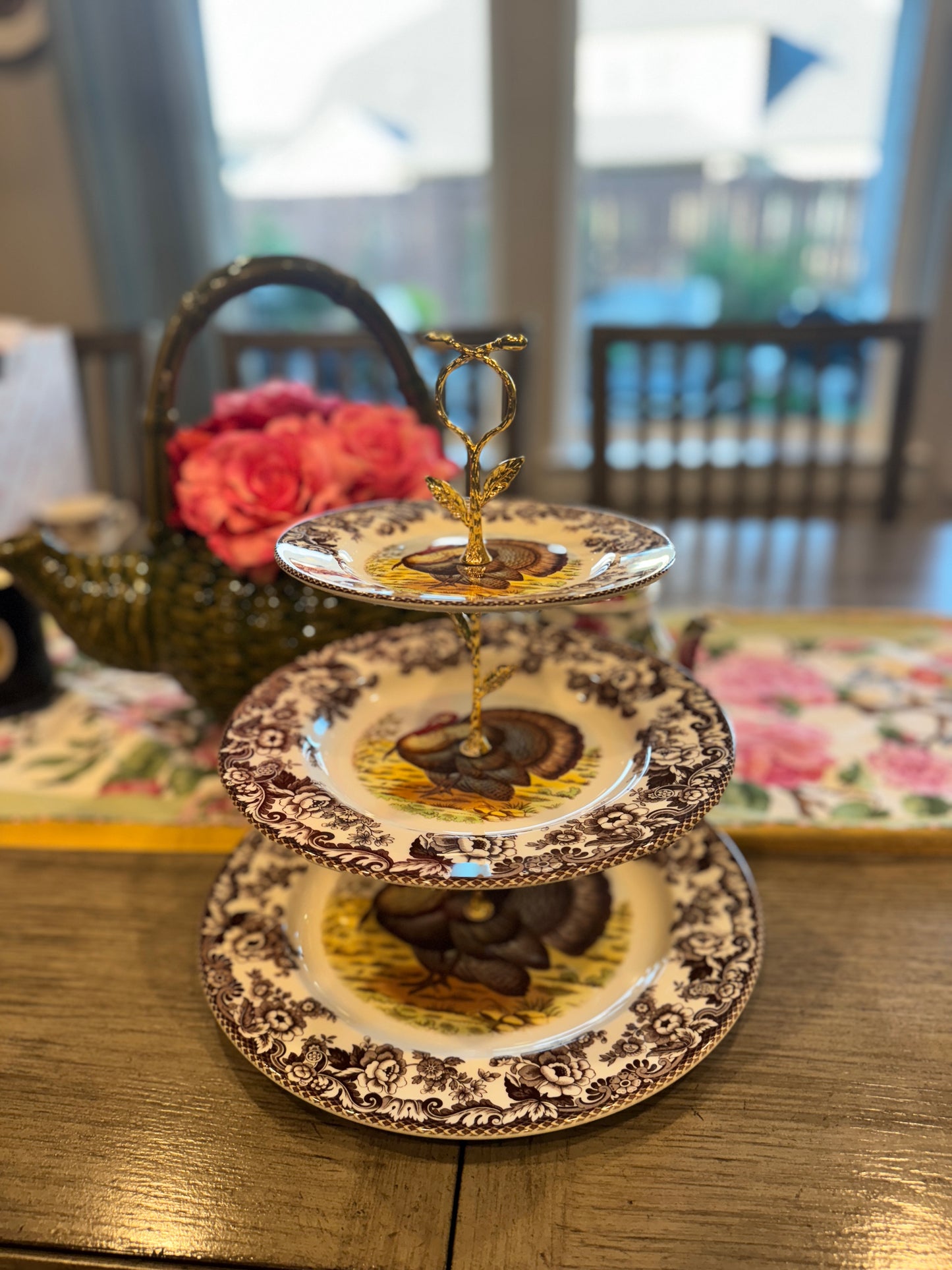 Three-tier stand made from Spode Woodland Turkey plates with rich wildlife illustrations and classic floral borders.