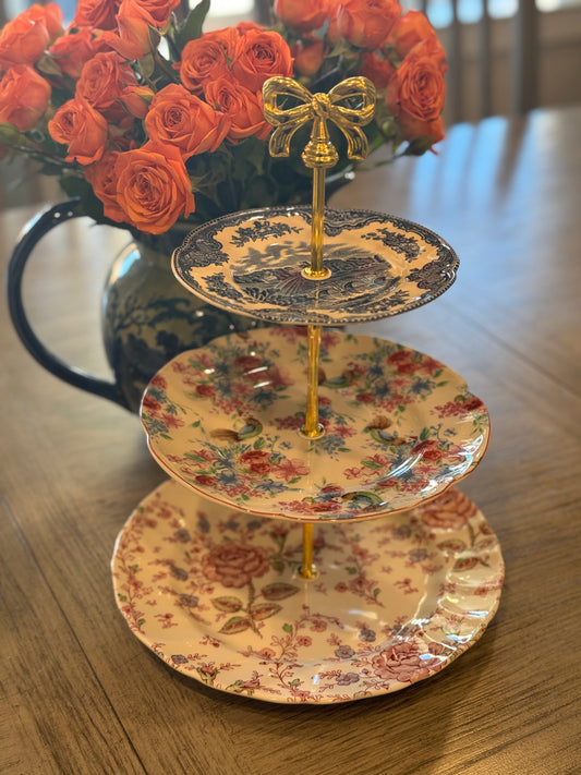 Three-tier stand made from vintage Johnson Brothers china, featuring rare Chicken Chintz and floral patterns.