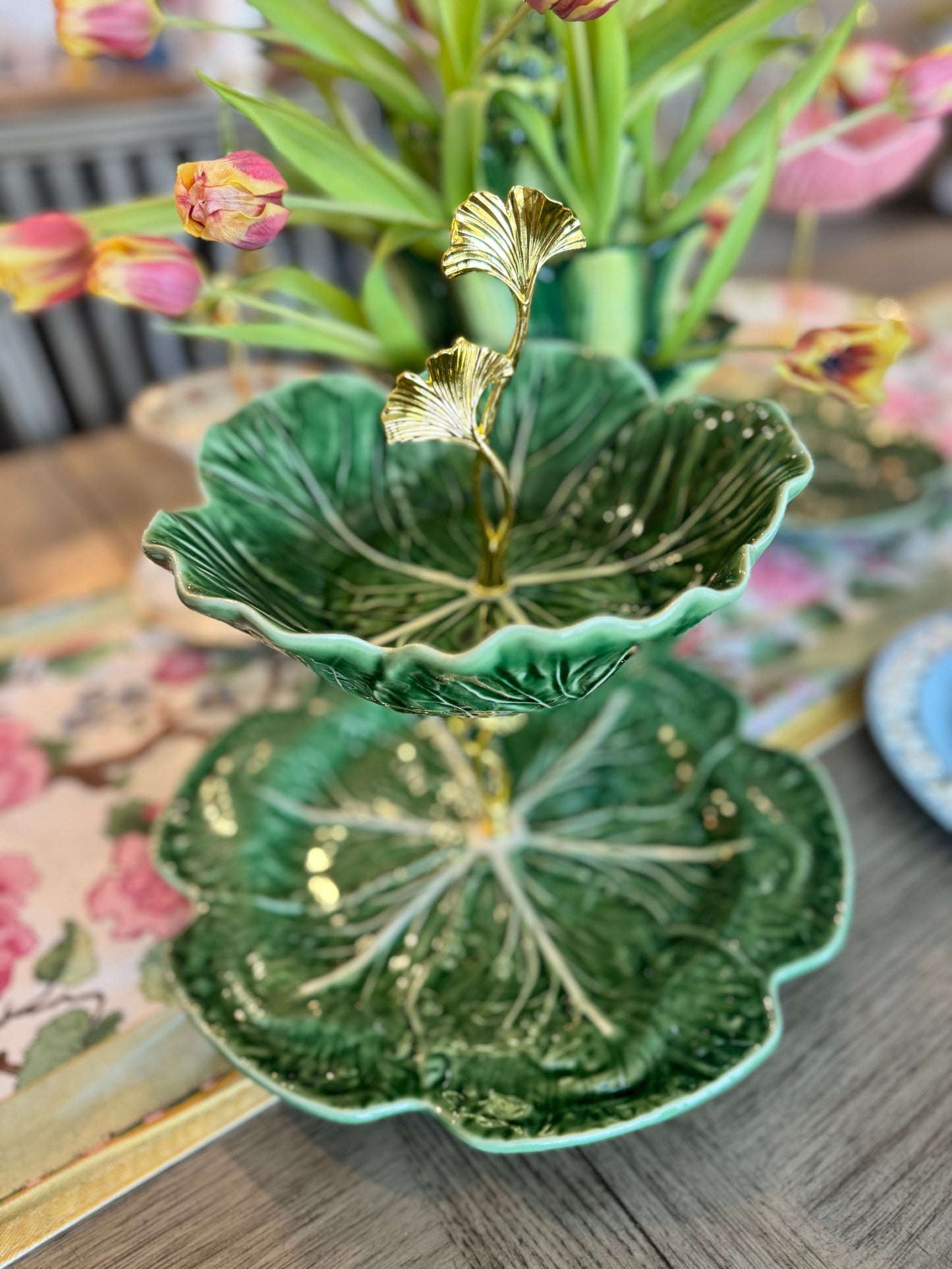 Handmade two-tiered stand made from Bordallo Pinheiro cabbageware with green leaf bowl and charger plate