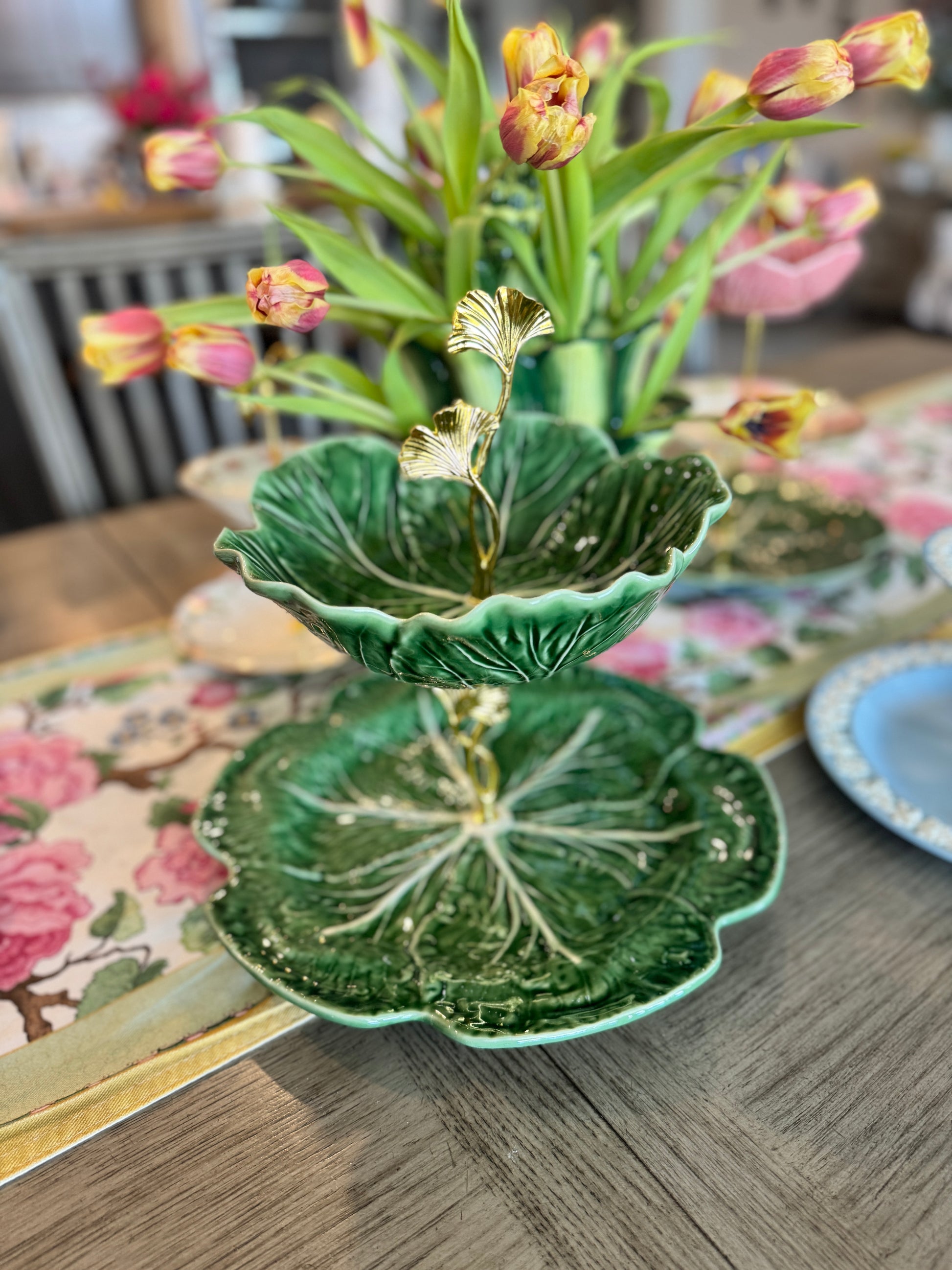 Handmade two-tiered stand made from Bordallo Pinheiro cabbageware with green leaf bowl and charger plate